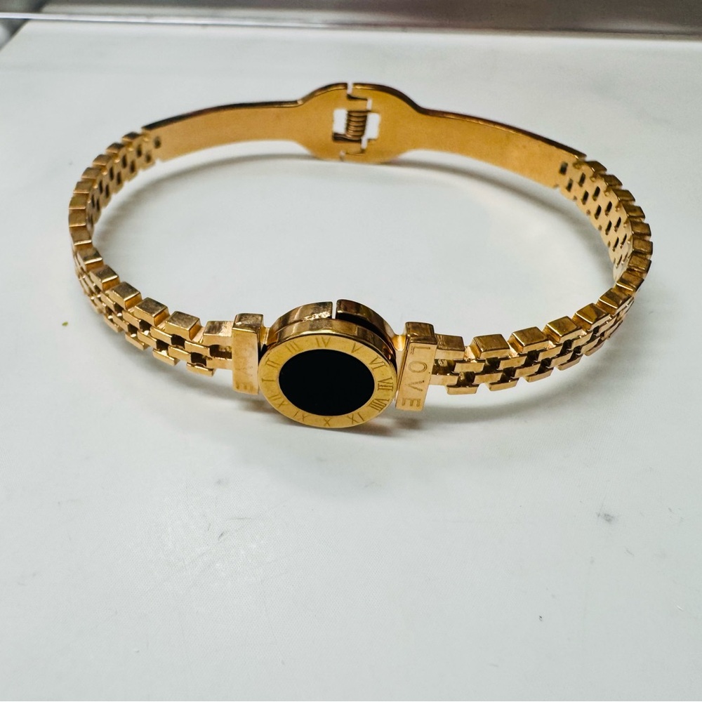 Bangle bracelet  NOT made by designer.